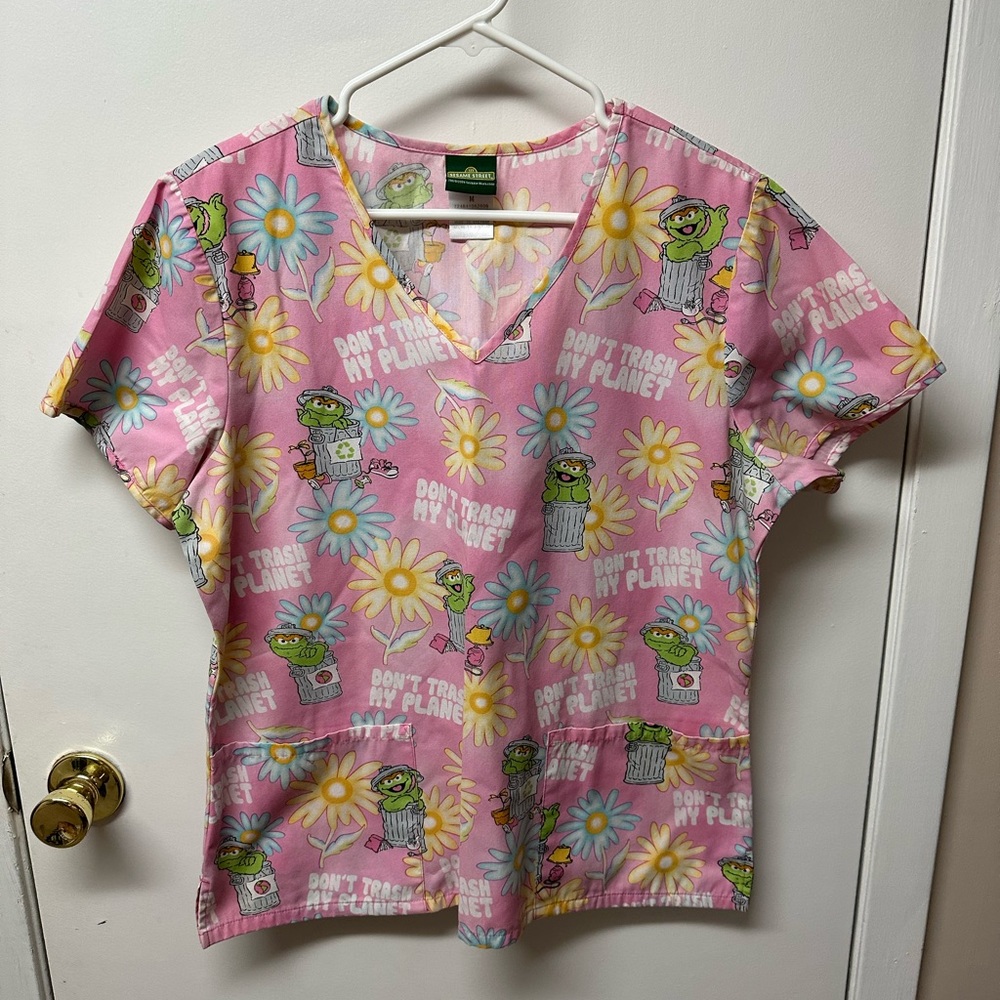 Women’s scrub top, excellent condition.
